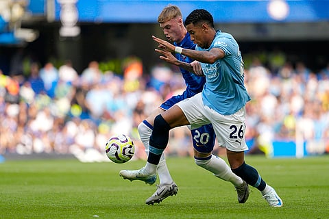 EPL 2024-25, Chelsea Vs Manchester City: Cole Palmer, left, challenges for the ball with Savinho